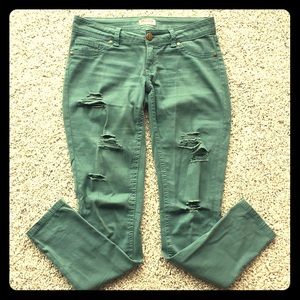 Teal distressed jeans